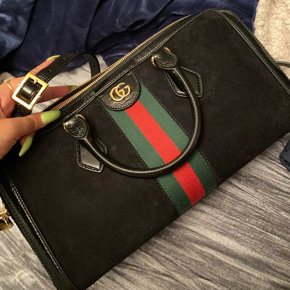 Used twice - ophidia medium top handle bag